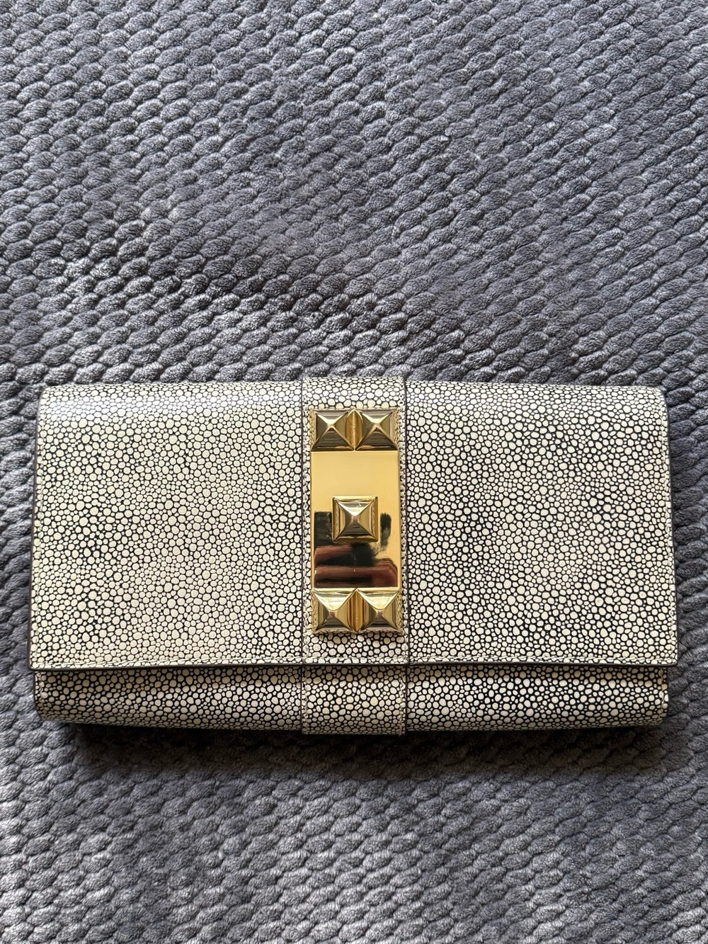 Vince Camuto White Pebbled Clutch with Gold Pyramid Accent